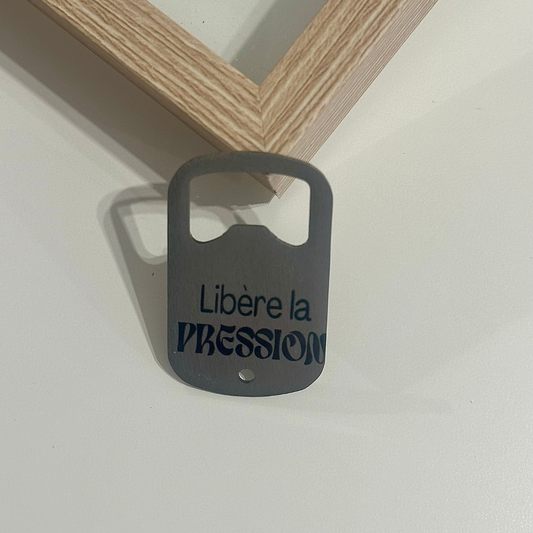 Décapsuleur "Libère la pression"